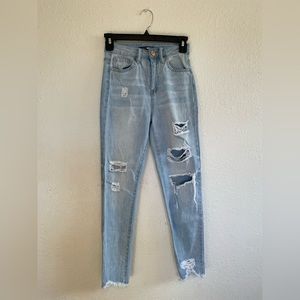 Petite high rises ripped blue jeans Size 0